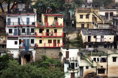 A small village near the banks of Ganga on the road between Rishikesh to Devprayag ; Uttaranchal ; India clipart