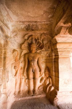 jain temple and statue of mahavira , Badami , Bagalkot , Karnataka , India clipart