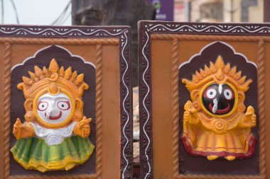 Painted embossed figure of lord jagannath and balabhadra, puri, orissa, india, asia  clipart