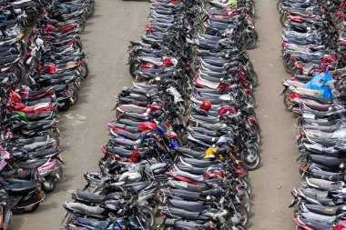 Motor bikes parked, mira road railway station, thane, maharashtra, india, asia  clipart