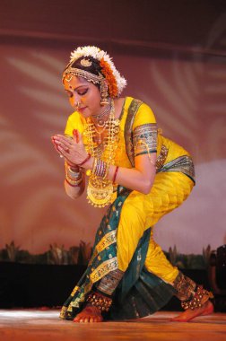 Bollywood actress and dancer-choreographer Hema Malini performs Bharatnatyam piece called Shiva Panchakshari at Indian Institute of Technology IIT college festival Mood Indigo; Bombay Mumbai ; Maharashtra ; India  clipart