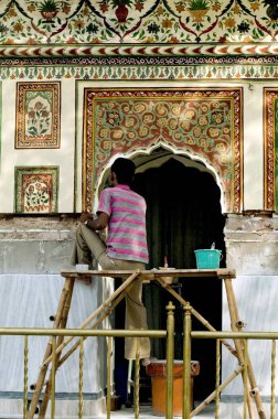 Man Painting Mansa Devi temple Panchkula punjab India clipart