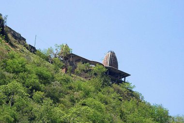 A temple on hill Vaishno Devi Jammu and Kashmir India clipart