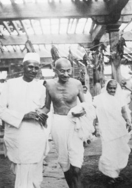 Mahatma Gandhi, Kasturba Gandhi and others in the house of Mr. Chhitabhai Patel at Bardoli, 1939, India   clipart
