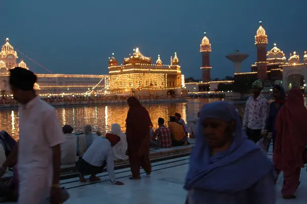 stock image Baishakhi is celebrated with lighting lamps and fire works on every 13th April at  Golden temple, Amritsar, Punjab, India 