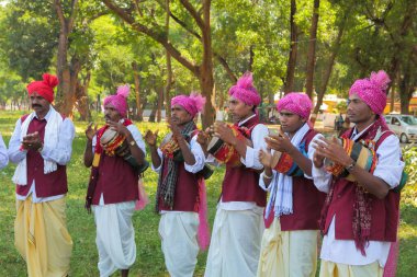 Tribal musicians playing folk music, jagdalpur, bastar, chhattisgarh, india, asia  clipart