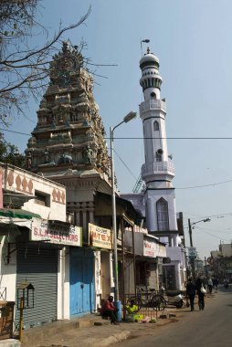 Sri Lakshmi Narasimhaswami temple and Juma Masjid in Shivajinagar ; Bangalore ; Karnataka ; India clipart
