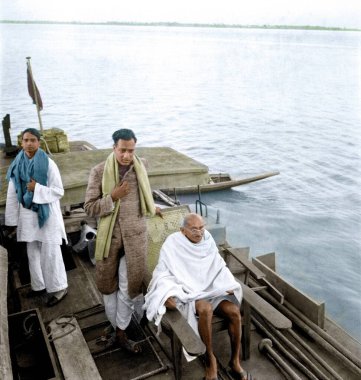 Sudhir Ghosh, Ramkrishna Bajaj, Mahatma Gandhi on boat to Midnapur, East Bengal, India, Asia, December 24, 1945 clipart