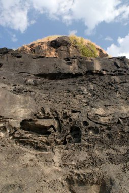 Harihareshvar 'daki deniz suyundaki erozyon; Taluka Shreevardhan; Raigadh Bölgesi; Maharashtra; Hindistan