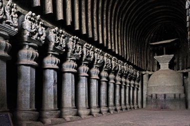 Pillars and stupa in karli karla cave chaityan in second century BC ; Lonavala ; Maharashtra ; India clipart