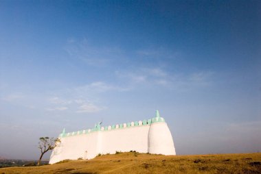 Part of idgaha Muslims pray or namaz on special day on small hill at Junnar village ; district Pune ; Maharashtra ; India clipart