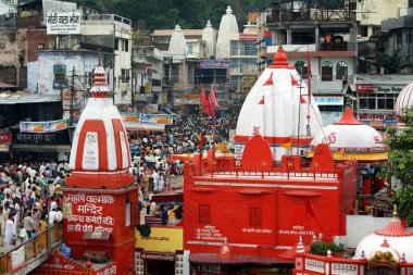 Temples near Har Ki Pauri literally means Footsteps of the Lord is considered the most sacred Ghat of Haridwar on the banks of river Ganga, Uttaranchal, India  clipart