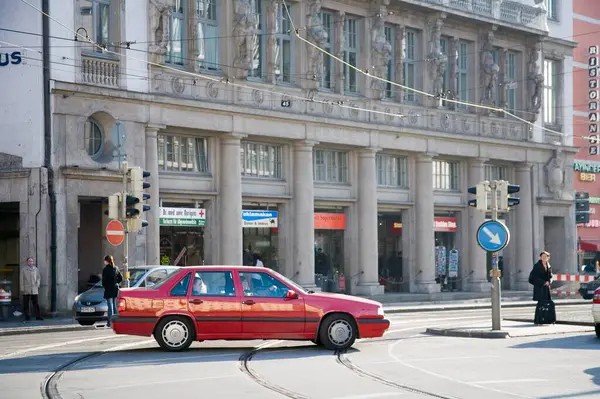 Stock image Red car on the street, Munich, Germany, Europe 