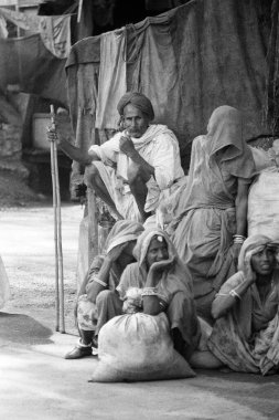 Pilgrims resting Badrinath Joshimath Garhwal Uttarakhand India 1978  clipart