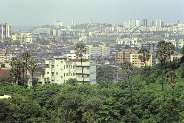 stock image Slum surrounded by building at Sion, Dharavi, Bombay Mumbai, Maharashtra, India 