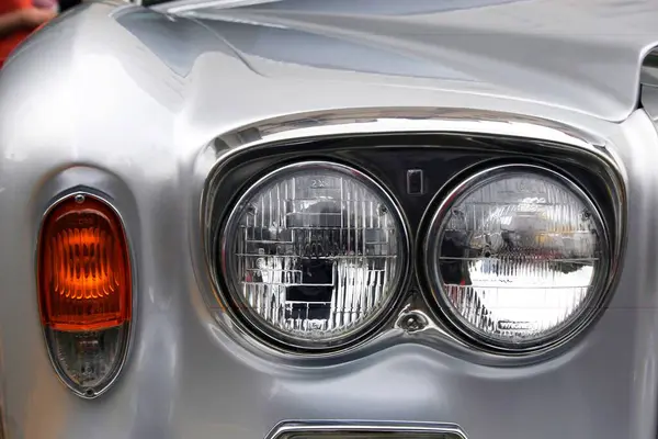 Stock image Orange indicator and head lights of the right side of the Rolls Royce car, Pune, Maharashtra, India 