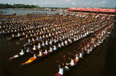 Nehru Boat Race Festivals , Snake Boat Race progress , jalostavam for Haripad Subramanya Temple , Alappuzha alleppey , Kerala , india clipart