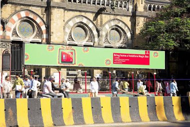 Advertising hording of Vodafone on Chatrapathi Shivaji Terminus BEST bus stop, Dr. Dadabhai Naoroji road, Bombay Mumbai, Maharashtra, India  clipart