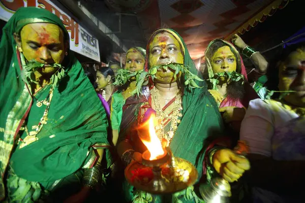 stock image Eunuch followers with tugged neem leaves praying before goddess Yellama ; wedding of eunuchs on occasion of Bewa Purnima at Ghatkopar ; Bombay now Mumbai ; Maharashtra ; India