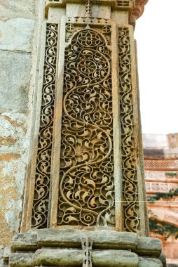 UNESCO world heritage Champaner Pavagadh ; Cenotaph of Nagina Masjid ; with beautiful floral carvings (Arabasc and Interwine designs) and jali work ; Champaner ; district Panchmahals ; Gujarat state ; India ; Asia clipart
