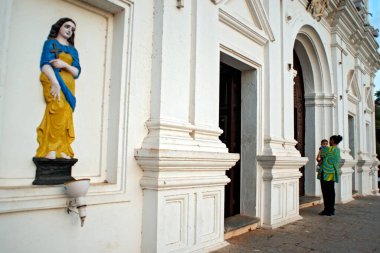 Devotee stand outside during mass at Church of Our lady Of Immaculate Conception, Panaji, Panijm, Goa, India     clipart