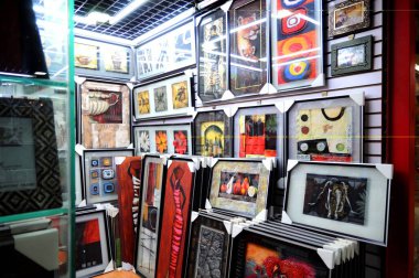 Display of paintings and frames in chinese shop ; Yiwu ; China clipart