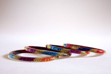 Colourful glass bangles white background