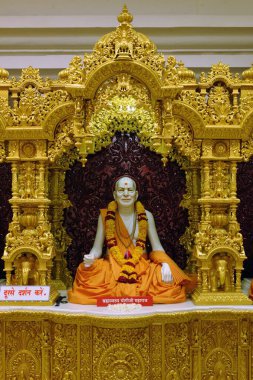 Yogiji maharaj statue shri swaminarayan mandir, tithal, gujarat, india, Asia clipart