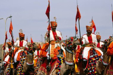 BSF jawans on Camel in Desert Festival rally, Jaisalmer, Rajasthan, India  clipart