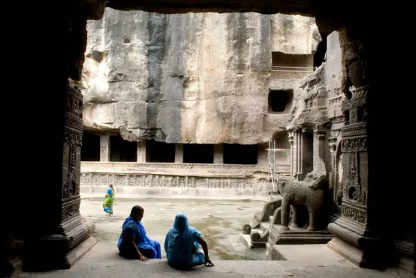 stock image Tourist at Kailash temple ; Ellora caves ; Aurangabad ; Maharashtra ; India