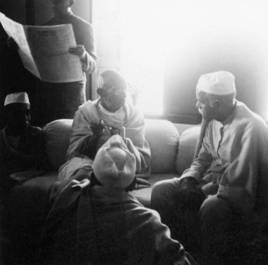Mahatma Gandhi talking to Madan Mohan Malaviya, Varanasi, 1941, India   clipart