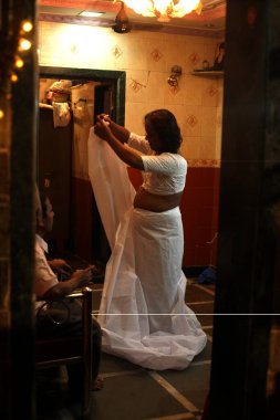 Eunuch wearing white sari as mark of widowhood after wedding of eunuchs on occasion of Bewa Purnima at Ghatkopar ; Bombay now Mumbai ; Maharashtra ; India clipart