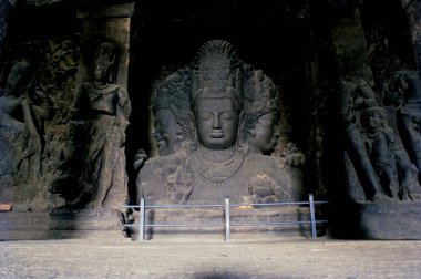 The Three headed God Shiva ; Trimurti Elephanta Caves ; maharashtra ; India clipart