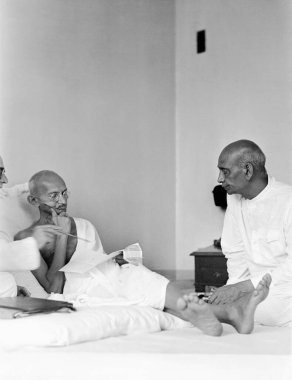 Mahatma Gandhi, talking with Sardar Vallabhbhai Patel at Birla House, Mumbai, August 1942, India    clipart
