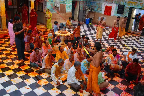 stock image Priest and devotees celebrating Rangpanchmi in Gangshyamji temple, Jodhpur, Rajasthan, India 