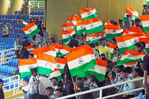 stock image Cricket fans waving Indian flag at D Y Patil cricket stadium, Nerul, Navi Mumbai, Maharashtra, India   