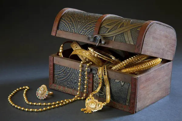 Wooden Jewellery box with Gold Bangles Necklace and Ring India Asia Nove 2011