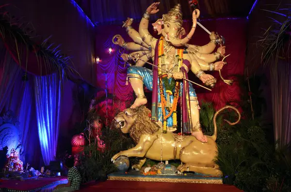 stock image Idol of Ganpati standing on lion in Baragalli Mandal Khetwadi mumbai Maharashtra India 