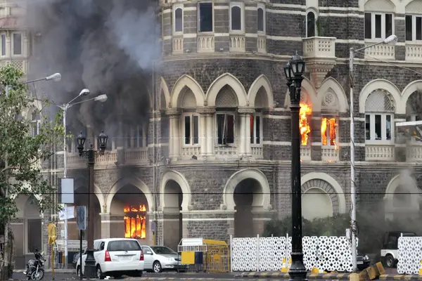 stock image Smoke and fire emits from Taj Mahal Hotel during terrorist attack ; Bombay Mumbai ; Maharashtra ; India 29-November-2008