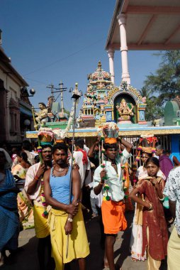 Devotees assembled near the Pillaiyar shrine (Ganpati temple) at the foot of the hill Adivaram Palani, Tamil Nadu, India  clipart