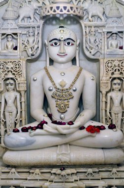 Indian Jain God of white marble Sirohi temple Rajasthan India Asia  clipart