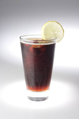 Cold drink in a glass with ice clipart