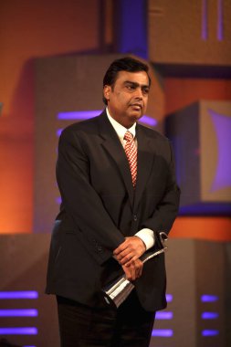 Mukesh Ambani ; Chairman and Managing Director of Reliance Industries Limited RIL after receiving CNBC-TV18s outstanding company of year award at CNBC-TV18 Indian Business Leader Award held recently in Bombay  Mumbai ; Maharashtra ; India  clipart