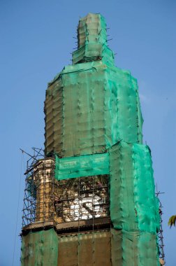 Undergoing repairs and restoration Rajabai Clock Tower mumbai Maharashtra India Asia clipart