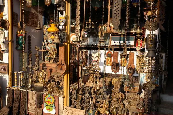 stock image Various idols masks, stones statues, bells, antique items, lamps, decorative items, kept for sell on Mattancherry and Jew Street in Fort Kochi, Ernakulam, Kerala, India 