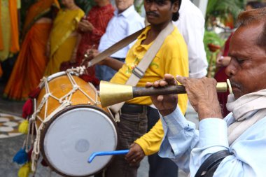 Musician playing Shehnai in wedding procession Jabalpur Madhya Pradesh India Asia   clipart
