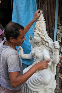 Erkekler heykeli çömlekçi sokağına boyadı, kolkata, batı bengal, Hindistan, Asya 