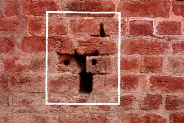Kurşun izleri Jalianwala Bagh, Amritsar, Punjab, Hindistan 'da korunmuş duvarda görülüyor.