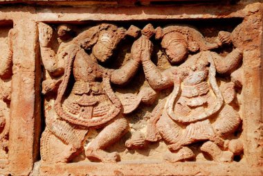Terracotta art on wall of Madan Mohan temple ; Vishnupur ; West Bengal ; India clipart