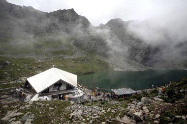 Sikhs shrine Shri Hemkund Sahib situated (4320 meters high) at Govind ghat which is the gateway to the Bhvundar or Lakshman Ganga valley, Uttaranchal, India  clipart